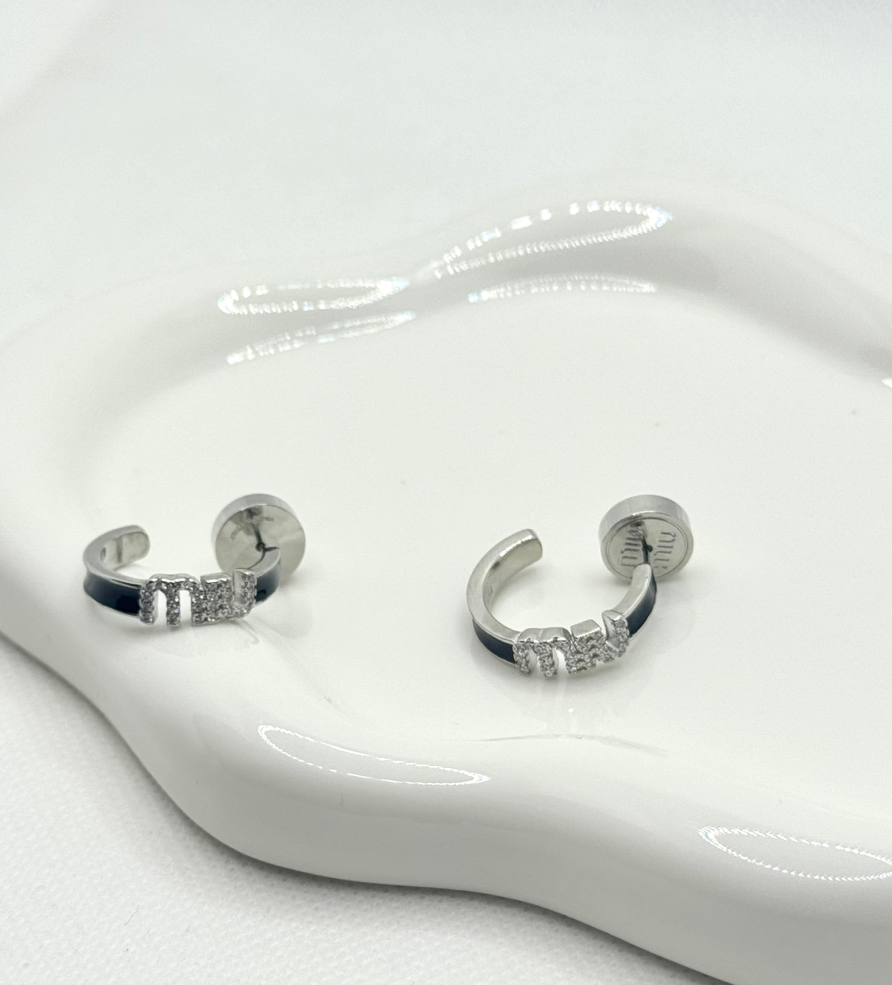 Miu Miu earrings now