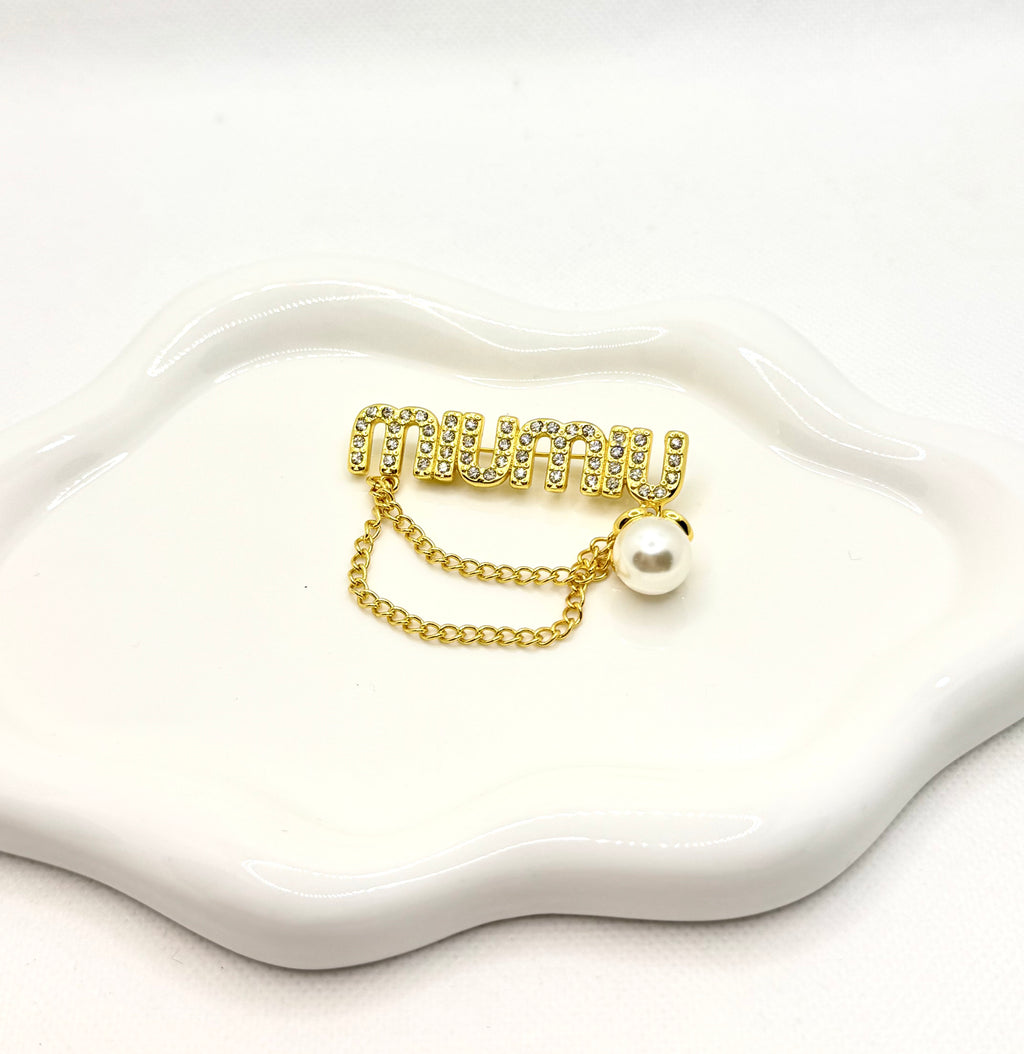 Miu Miu brooch