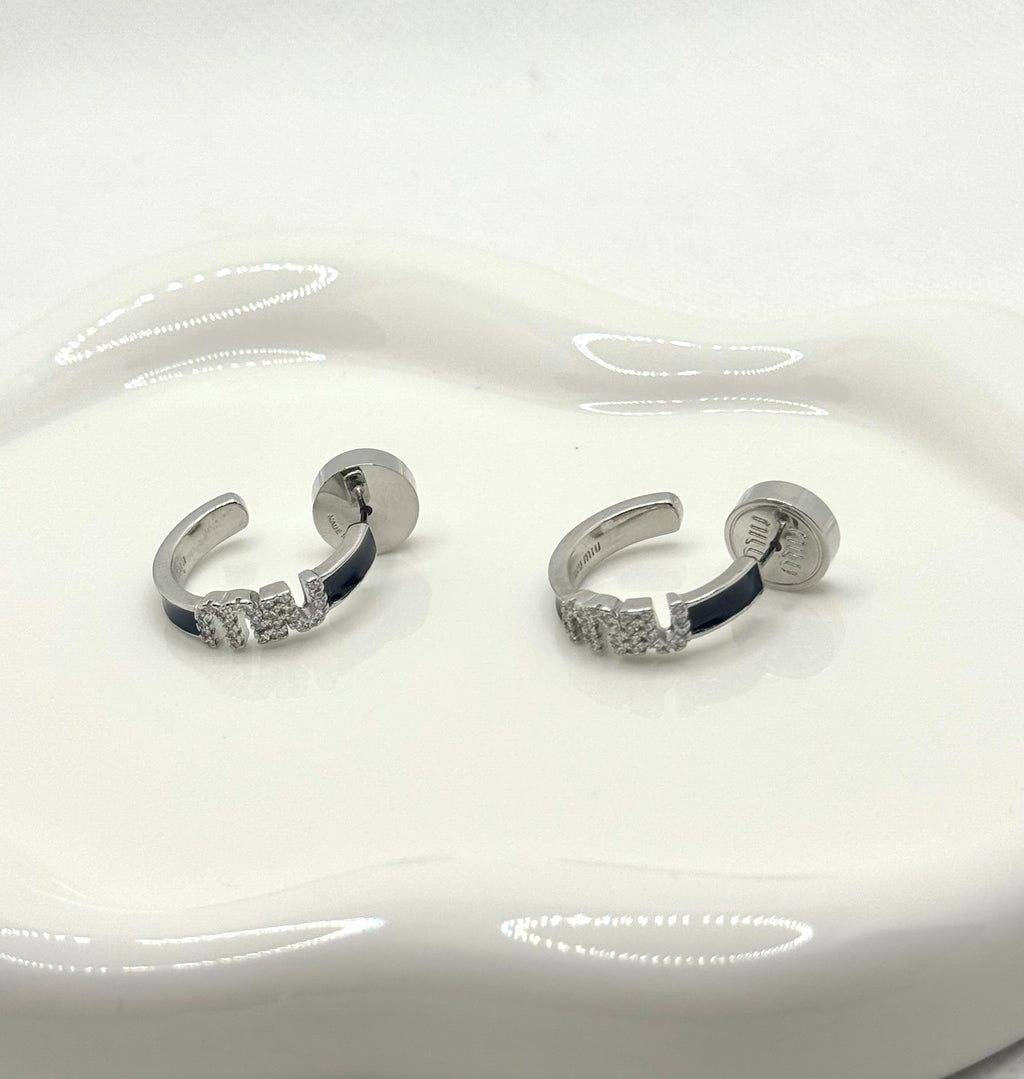 Miu Miu earrings now