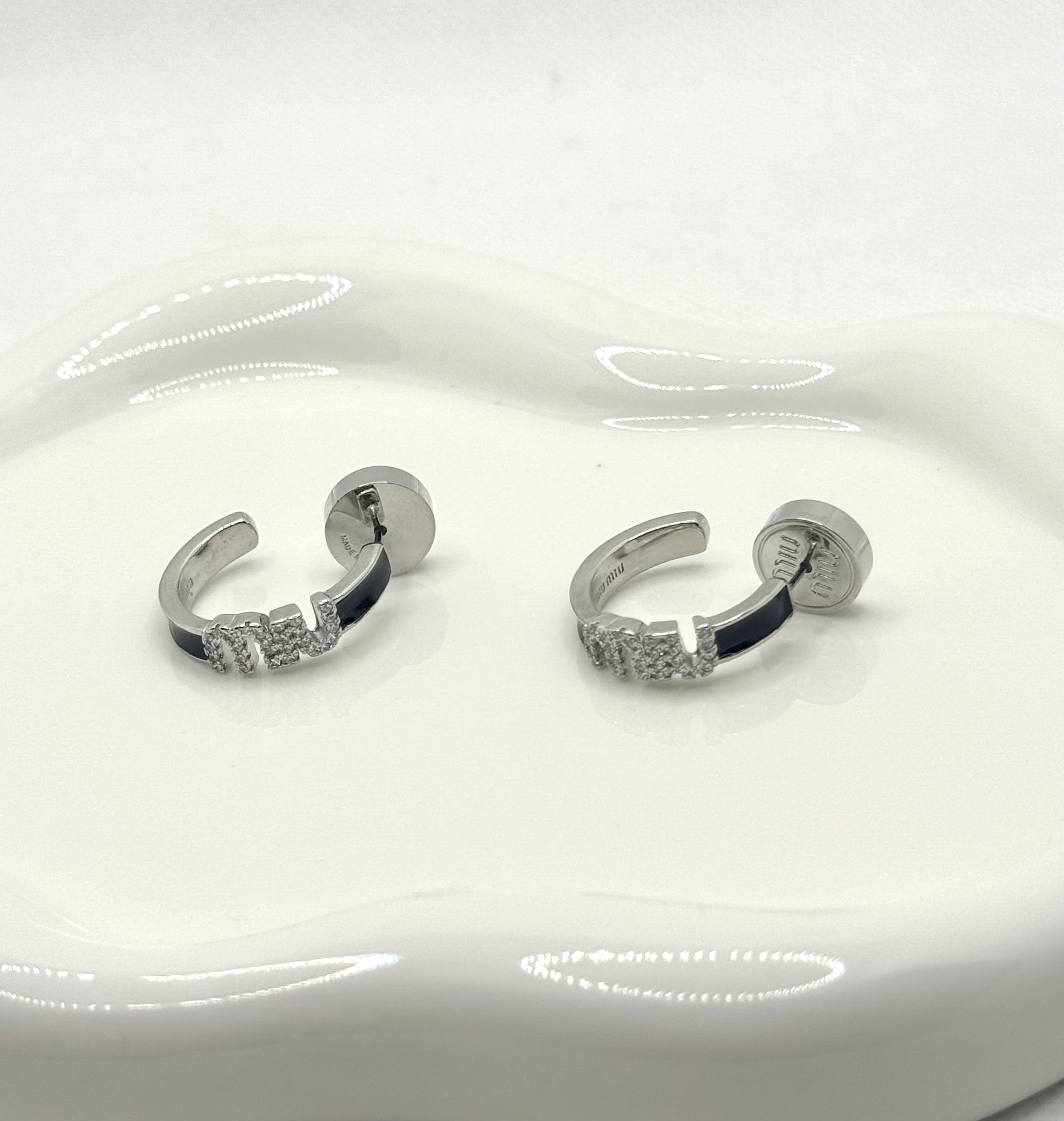 Miu Miu earrings now