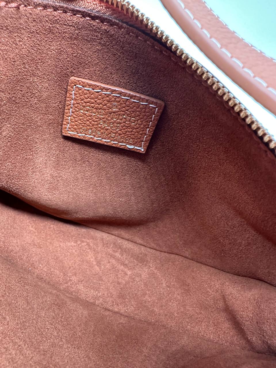LV low key bumbag taba