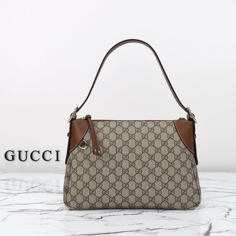 Gucci emblem shoulder bag canvas